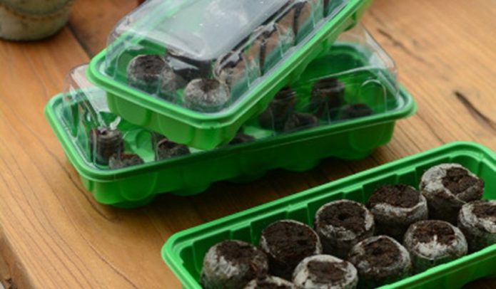 Peat tablets in containers