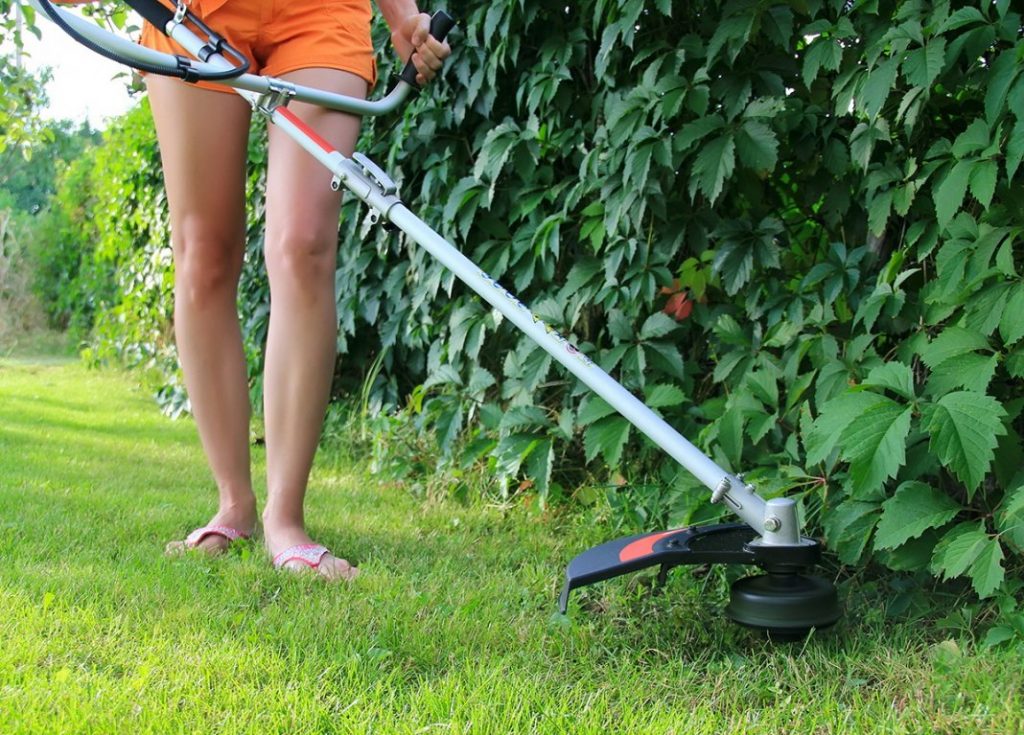 Mowing the lawn in autumn